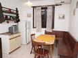 Supetar, Comedor in the apartment, air condition available.