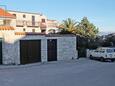 Parking lot Supetar, Brač, Parking lot 6026 - Apartments with pebble beach.