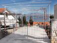 Parking lot Postira, Brač, Parking lot 6049 - Apartments with pebble beach.