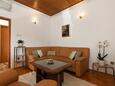 Postira, Living room in the apartment, air condition available and WiFi.