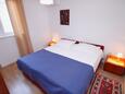 Slatine, Bedroom in the apartment, air condition available and WiFi.