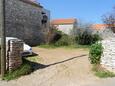 Supetar, Brač, Parking 6075 - Appartement à proximité de la mer avec une plage de galets.