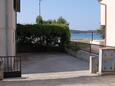 Žaborić, Šibenik, Parking lot 6097 - Apartments near sea with pebble beach.