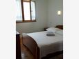 Podstrana, Dormitorio in the apartment, air condition available y WiFi.