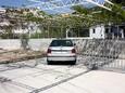 Parking lot Marina, Trogir, Parking lot 6116 - Apartments near sea with pebble beach.