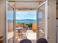 Posedarje, Terrasse dans l’hébergement en type apartment, avec la vue sur la mer et WiFi.