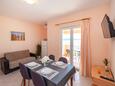 Posedarje, Comedor in the apartment, air condition available y WiFi.