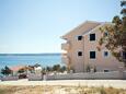 Posedarje, Novigrad, Hébergement 6162 - Appartement à proximité de la mer avec une plage de galets.