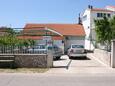 Tribunj, Vodice, Parkeerplaats 6247 - Appartementen with pebble beach.