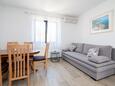 Obývací pokoj Tkon, Obývací pokoj v ubytování typu apartment, s klimatizací a WiFi.