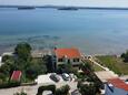 Tkon, Pašman, Property 6262 - Apartments near sea with sandy beach.