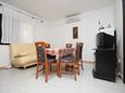 Jídelna Povljana, Jídelna v ubytování typu apartment, s klimatizací, domácí mazlíčci povoleni a WiFi.