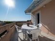 Terrace Povljana, Terrace in the apartment, with a sea view, (pet friendly) and WiFi.