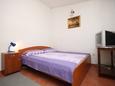 Ložnice Pag, Ložnice v ubytování typu studio-apartment, s klimatizací a WiFi.