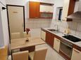Jídelna Pag, Jídelna v ubytování typu apartment, domácí mazlíčci povoleni a WiFi.
