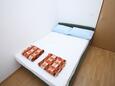 Ložnice Metajna, Ložnice v ubytování typu apartment, domácí mazlíčci povoleni a WiFi.