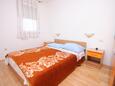 Ložnice Novalja, Ložnice v ubytování typu apartment, domácí mazlíčci povoleni a WiFi.