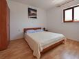 Kustići, Bedroom in the apartment, (pet friendly) and WiFi.