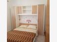 Kustići, Bedroom 1 in the apartment, (pet friendly) and WiFi.