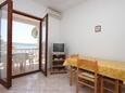 Blagovaonica Kustići, Blagovaonica u smještaju tipa apartment, dostupna klima i WiFi.