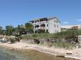 Szálláshely Vidalići, Pag, Szálláshely 6359 - Apartmanok a tenger közelében kavicsos stranddal.