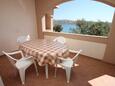 Kustići, Terrace in the apartment, with a sea view and (pet friendly).