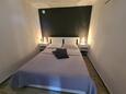 Спальня Mokalo, Спальня в размещении типа studio-apartment, доступный кондиционер, Домашние животные допускаются и WiFi.