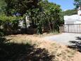 Parkiralište Stara Novalja, Pag, Parkiralište 6390 - Apartmani blizu mora sa pješčanom plažom.