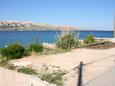 Metajna, Pag, Parking lot 6395 - Apartments near sea with pebble beach.