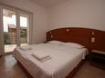 Bedroom Novalja, Bedroom in the apartment, air condition available, (pet friendly) and WiFi.