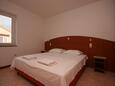 Novalja, Bedroom in the apartment, air condition available, (pet friendly) and WiFi.