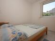 Ložnice Mandre, Ložnice v ubytování typu apartment, domácí mazlíčci povoleni a WiFi.