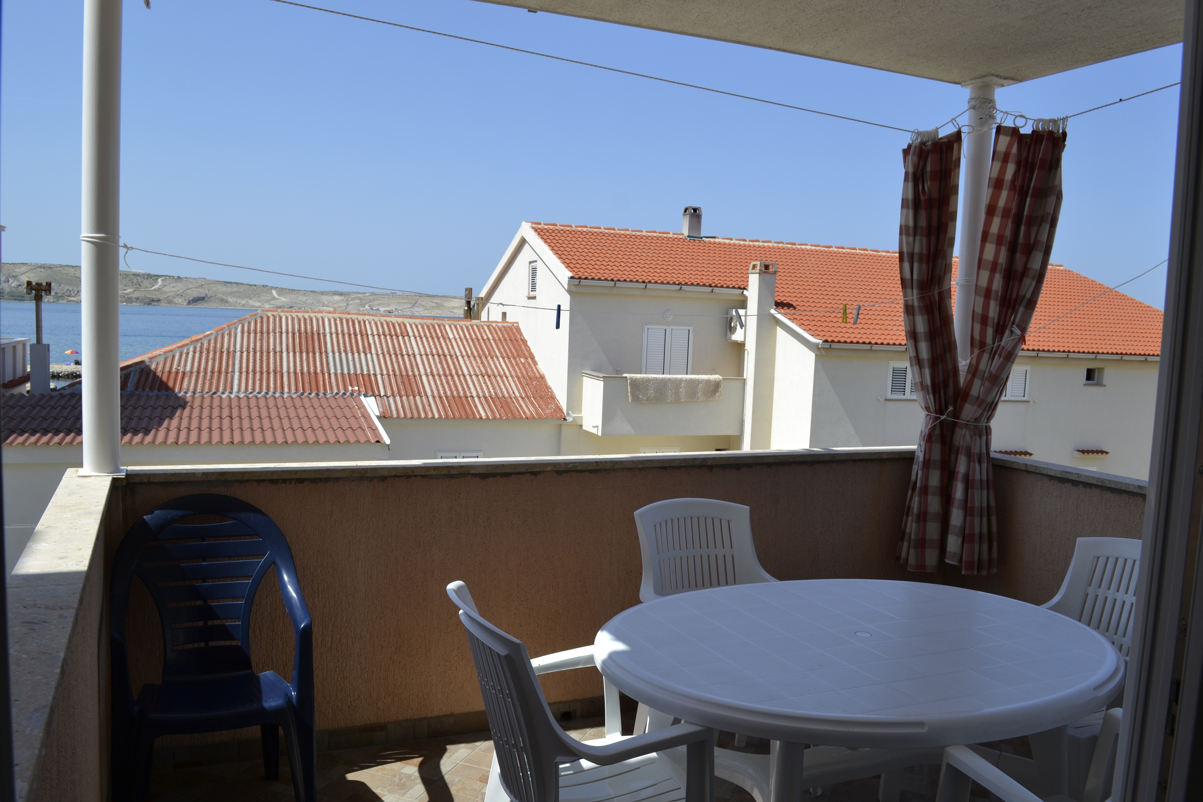 Two bedroom apartment with terrace and sea view Kustići, Pag  A-a