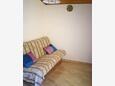 Rabac, Sala de estar in the apartment, air condition available y WiFi.