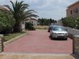 Parking lot Povljana, Pag, Parking lot 6435 - Apartments with sandy beach.