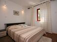 Bedroom Mandre, Bedroom in the apartment, air condition available and WiFi.