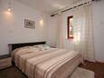 Mandre, Dormitorio in the apartment, air condition available y WiFi.