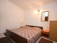 Ložnice Novalja, Ložnice v ubytování typu apartment, domácí mazlíčci povoleni a WiFi.