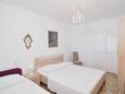 Ložnice 1 Seget Vranjica, Ložnice 1 v ubytování typu apartment, domácí mazlíčci povoleni a WiFi.
