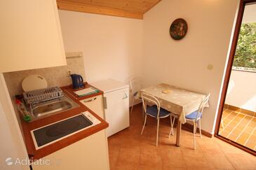 Starigrad, Jídelna v ubytování typu apartment, domácí mazlíčci povoleni a WiFi.