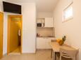 Dining room Makarska, Dining room in the studio-apartment, air condition available and WiFi.