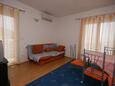 Obývací pokoj Makarska, Obývací pokoj v ubytování typu apartment, s klimatizací a WiFi.