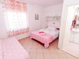Спальня 2 Podgora, Спальня 2 в размещении типа apartment, доступный кондиционер и WiFi.