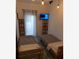 Ložnice 2 Podaca, Ložnice 2 v ubytování typu apartment, s klimatizací, domácí mazlíčci povoleni a WiFi.