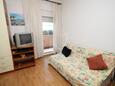 Obývací pokoj Makarska, Obývací pokoj v ubytování typu apartment, s klimatizací, domácí mazlíčci povoleni a WiFi.