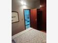 Podgora, Ložnice v ubytování typu apartment, domácí mazlíčci povoleni a WiFi.