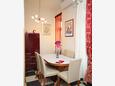 Dining room Podgora, Dining room in the apartment, air condition available, (pet friendly) and WiFi.