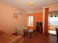 Living room Baška Voda, Living room in the apartment, air condition available and WiFi.