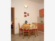 Dining room Podgora, Dining room in the apartment, air condition available, (pet friendly) and WiFi.