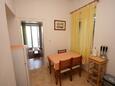 Dining room Podgora, Dining room in the apartment, air condition available and WiFi.